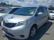 2014 Toyota Sienna L with VIN 5TDZK3DC9ES518653, listed as a IAAI auction lot 42767591 with 261,730 mi miles and . Bid and sale history available at DreamBid. Image 2.