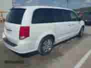 2014 Dodge Grand Caravan SE with VIN 2C4RDGBG1ER114603, listed as a IAAI auction lot 43201305 with 206,724 mi miles and . Bid and sale history available at DreamBid. Image 4.
