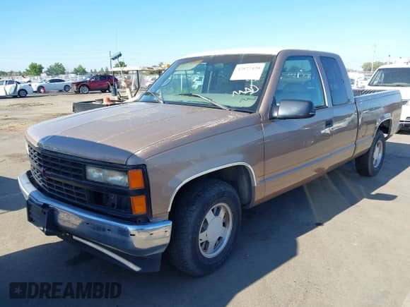 1996 GMC Sierra 1500 z VIN 1GTEC19R0TE524941, wystawiony jako IAAI lot #42827420 z przebiegiem 186 246 mil mil oraz . Historia ofert i sprzedaży dostępna na DreamBid. Obrazek 2.