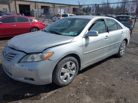 2007 Toyota Camry CE с VIN 4T1BE46K27U007427, выставлен на аукционе IAAI как лот 41839451 с пробегом 238 236 миль миль и . История ставок и продаж доступна на DreamBid. Изображение 2.