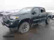 2022 Toyota Tacoma Limited with VIN 3TMGZ5AN4NM463887, listed as a IAAI auction lot 41592060 with 61,026 mi miles and . Bid and sale history available at DreamBid. Image 21.