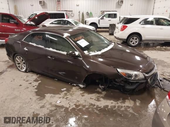 2015 Chevrolet Malibu LTZ with VIN 1G11F5SL0FF203329, listed as a IAAI auction lot 41310725 with 81,968 mi miles and . Bid and sale history available at DreamBid. Image 1.