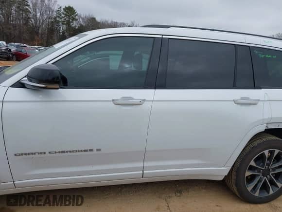 2023 Jeep Grand Cherokee Overland with VIN 1C4RJKDT9P8107466, listed as a IAAI auction lot 41428743 with 34,317 mi miles and . Bid and sale history available at DreamBid. Image 14.