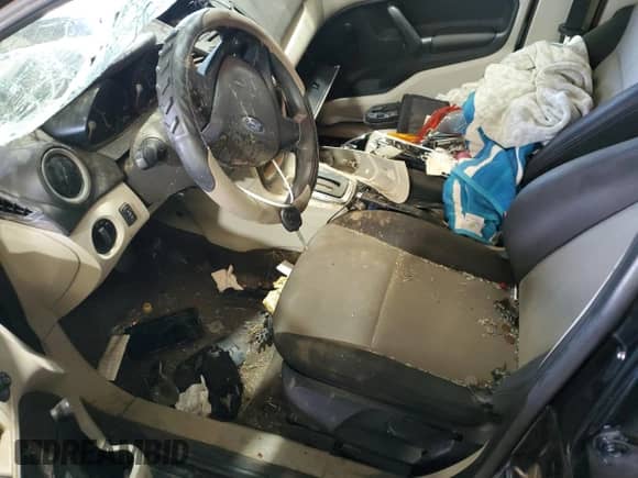 2011 Ford Fiesta S with VIN 3FADP4AJ7BM232421, listed as a Copart auction lot 69362695 with 142,734 mi miles and Salvage title. Bid and sale history available at DreamBid. Image 7.