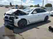 2023 BMW i4 eDrive35 z VIN WBY43AW0XPFP76986, wystawiony jako Copart lot #50745225 z przebiegiem 14 128 mil mil oraz Szkoda całkowita • Salvage title. Historia ofert i sprzedaży dostępna na DreamBid. Obrazek 1.