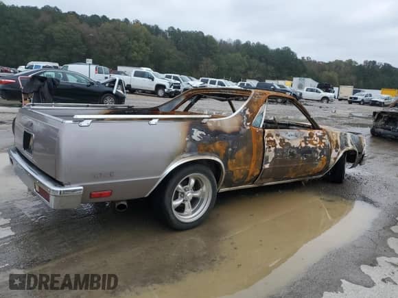 1983 Chevrolet El Camino с VIN 1GCCW80H6DR215660, выставлен на аукционе Copart как лот 82537994 с пробегом Не указан миль и Списание • Salvage title. История ставок и продаж доступна на DreamBid. Изображение 3.