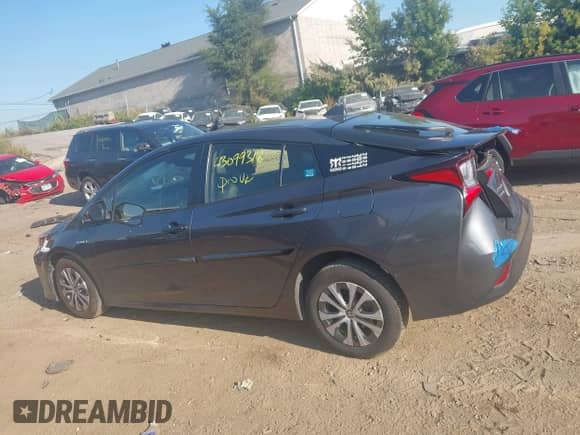 2021 Toyota Prius LE with VIN JTDL9MFU8M3028928, listed as a IAAI auction lot 43099318 with 72,833 mi miles and . Bid and sale history available at DreamBid. Image 14.