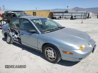 2002 Saturn SL с VIN 1G8ZK52712Z291884, выставлен на аукционе Copart как лот 66075874 с пробегом 62 275 миль миль и Списание • Salvage title. История ставок и продаж доступна на DreamBid. Изображение 4.