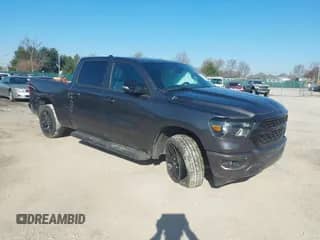 2022 Ram 1500 Big Horn with VIN 1C6SRFMT8NN267989, listed as a IAAI auction lot 41662706 with 68,748 mi miles and . Bid and sale history available at DreamBid. Image 1.