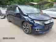 2018 Honda Odyssey Elite with VIN 5FNRL6H92JB030933, listed as a IAAI auction lot 43397917 with 74,671 mi miles and . Bid and sale history available at DreamBid. Image 1.