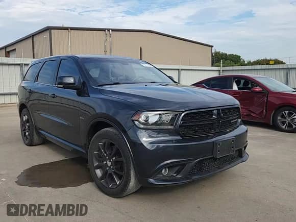 2015 Dodge Durango R/T with VIN 1C4SDHCT4FC176283, listed as a Copart auction lot 69117905 with 180,329 mi miles and Salvage title. Bid and sale history available at DreamBid. Image 13.