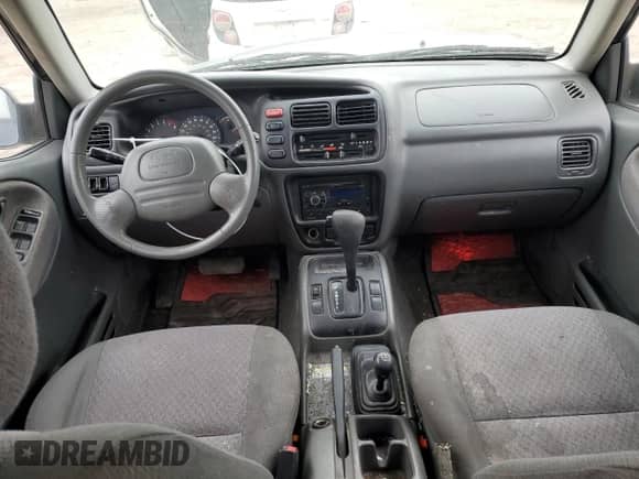 2000 Chevrolet Tracker with VIN 2CNBJ13C0Y6917889, listed as a Copart auction lot 42703105 with Not provided miles and Salvage title. Bid and sale history available at DreamBid. Image 8.