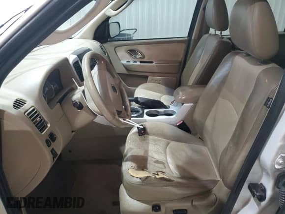 2007 Mercury Mariner Premier with VIN 4M2CU971X7KJ11281, listed as a Copart auction lot 70717105 with 149,938 mi miles and Salvage title. Bid and sale history available at DreamBid. Image 7.