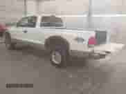 1999 Dodge Dakota SLT with VIN 1B7GG22XXXS254782, listed as a IAAI auction lot 41847644 with 164,607 mi miles and . Bid and sale history available at DreamBid. Image 3.