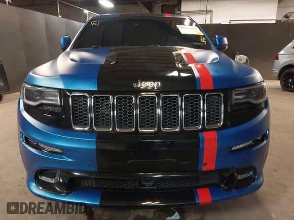 2014 Jeep Grand Cherokee SRT-8 z VIN 1C4RJFDJ0EC497826, wystawiony jako IAAI lot #38543666 z przebiegiem 79 937 mil mil oraz . Historia ofert i sprzedaży dostępna na DreamBid. Obrazek 6.