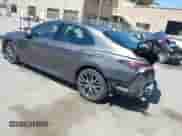 2021 Toyota Camry Hybrid XLE with VIN 4T1F31AK9MU560049, listed as a IAAI auction lot 42211169 with 182,185 mi miles and . Bid and sale history available at DreamBid. Image 3.