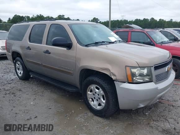 2007 Chevrolet Suburban LTZ z VIN 1GNFC160X7R232116, wystawiony jako IAAI lot #43413153 z przebiegiem Nie podano mil oraz . Historia ofert i sprzedaży dostępna na DreamBid. Obrazek 1.