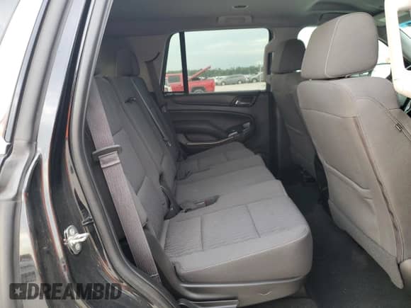 2018 Chevrolet Tahoe LS z VIN 1GNSCAKC7JR393867, wystawiony jako Copart lot #82560285 z przebiegiem 118 166 mil mil oraz Czysty tytuł • Clean title. Historia ofert i sprzedaży dostępna na DreamBid. Obrazek 11.