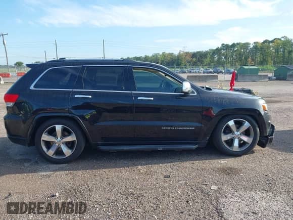 2015 Jeep Grand Cherokee High Altitude with VIN 1C4RJFCG3FC174006, listed as a IAAI auction lot 42900356 with 163,261 mi miles and . Bid and sale history available at DreamBid. Image 13.
