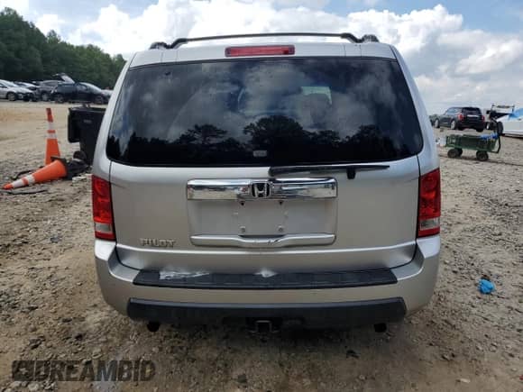 2010 Honda Pilot LX with VIN 5FNYF3H24AB007366, listed as a Copart auction lot 65041855 with 197,185 mi miles and Salvage title. Bid and sale history available at DreamBid. Image 6.