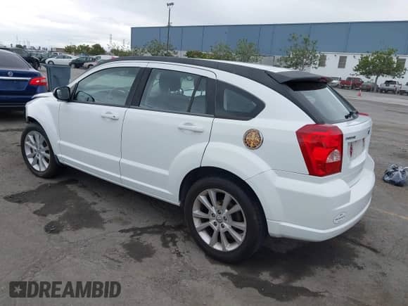 2011 Dodge Caliber Heat with VIN 1B3CB5HA1BD172908, listed as a IAAI auction lot 43438551 with 153,540 mi miles and . Bid and sale history available at DreamBid. Image 3.