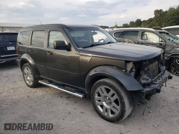 2011 Dodge Nitro Heat с VIN 1D4PT4GX9BW500256, выставлен на аукционе Copart как лот 72530634 с пробегом 103 964 миль миль и Списание • Salvage title. История ставок и продаж доступна на DreamBid. Изображение 4.