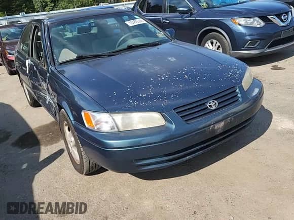 1997 Toyota Camry LE z VIN 4T1BF22K1VU900614, wystawiony jako Copart lot #80455505 z przebiegiem 200 444 mil mil oraz Szkoda całkowita • Salvage title. Historia ofert i sprzedaży dostępna na DreamBid. Obrazek 14.