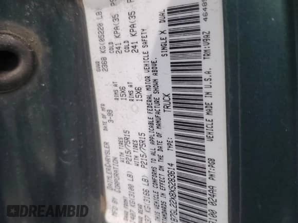 1999 Dodge Dakota SLT with VIN 1B7GL22X8XS283614, listed as a Copart auction lot 59412515 with 69,705 mi miles and Salvage title. Bid and sale history available at DreamBid. Image 12.