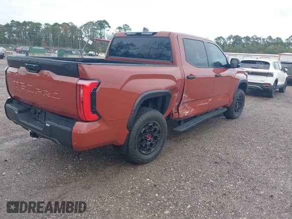 2024 Toyota Tundra TRD Pro Hybrid with VIN 5TFPC5DB8RX054584, listed as a IAAI auction lot 43360883 with 29,952 mi miles and . Bid and sale history available at DreamBid. Image 4.