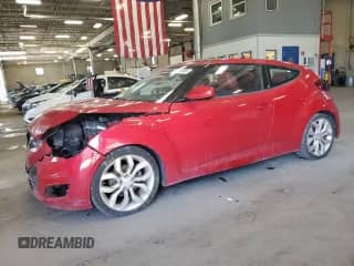2012 Hyundai Veloster w/Red Int z VIN KMHTC6AD0CU027782, wystawiony jako Copart lot #81558205 z przebiegiem 104 484 mil mil oraz Szkoda całkowita • Salvage title. Historia ofert i sprzedaży dostępna na DreamBid. Obrazek 1.