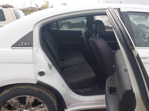 2013 Chrysler 200 Touring with VIN 1C3CCBBB7DN714204, listed as a IAAI auction lot 43469536 with 213,674 mi miles and . Bid and sale history available at DreamBid. Image 8.