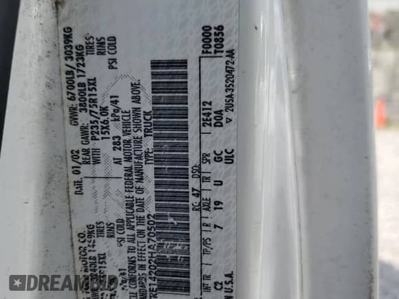 2002 Ford Econoline Cargo with VIN 1FTRE14202HA70502, listed as a Copart auction lot 65346325 with 195,220 mi miles and Salvage title. Bid and sale history available at DreamBid. Image 13.