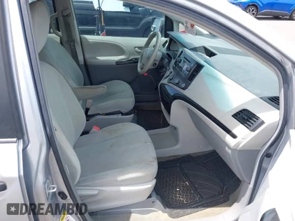 2012 Toyota Sienna with VIN 5TDZK3DC2CS187217, listed as a IAAI auction lot 42621010 with 112,463 mi miles and . Bid and sale history available at DreamBid. Image 5.