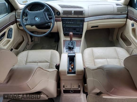 1998 BMW 7 Series 740iL with VIN WBAGJ8321WDM23045, listed as a Copart auction lot 87018324 with 43,906 mi miles and Salvage title. Bid and sale history available at DreamBid. Image 8.