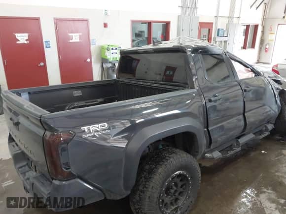 2024 Toyota Tacoma SR5 with VIN 3TMLB5JN9RM034074, listed as a IAAI auction lot 43293871 with Not provided miles and . Bid and sale history available at DreamBid. Image 15.