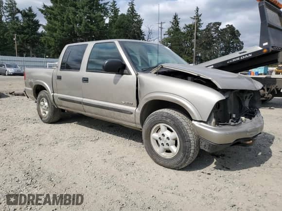 2004 Chevrolet S-10 LS z VIN 1GCDT13X54K132267, wystawiony jako Copart lot #71161265 z przebiegiem 239 585 mil mil oraz Szkoda całkowita • Salvage title. Historia ofert i sprzedaży dostępna na DreamBid. Obrazek 4.