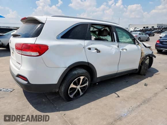 2016 Kia Sorento EX with VIN 5XYPH4A12GG186490, listed as a Copart auction lot 69231385 with 115,060 mi miles and Salvage title. Bid and sale history available at DreamBid. Image 3.
