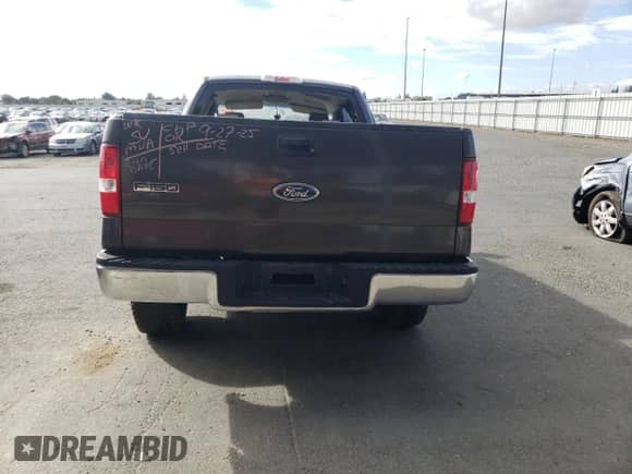 2005 Ford F-150 XLT with VIN 1FTPX12515FB27501, listed as a Copart auction lot 84523385 with 184,326 mi miles and Salvage title. Bid and sale history available at DreamBid. Image 6.