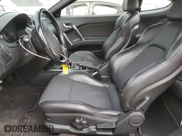 2008 Hyundai Tiburon GT с VIN KMHHN66F48U267449, выставлен на аукционе Copart как лот 60406785 с пробегом 25 262 миль миль и Списание • Salvage title. История ставок и продаж доступна на DreamBid. Изображение 7.
