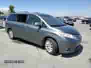 2014 Toyota Sienna Limited с VIN 5TDDK3DC6ES082158, выставлен на аукционе Copart как лот 69840625 с пробегом 138 609 миль миль и Списание • Salvage title. История ставок и продаж доступна на DreamBid. Изображение 4.