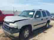 2005 Chevrolet Tahoe LT z VIN 1GNEC13T25J147583, wystawiony jako IAAI lot #42275971 z przebiegiem 244 307 mil mil oraz . Historia ofert i sprzedaży dostępna na DreamBid. Obrazek 2.