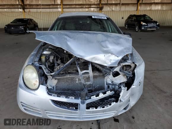2005 Dodge Neon SXT z VIN 1B3ES56C05D122339, wystawiony jako Copart lot #81666814 z przebiegiem 156 502 mil mil oraz Szkoda całkowita • Salvage title. Historia ofert i sprzedaży dostępna na DreamBid. Obrazek 5.