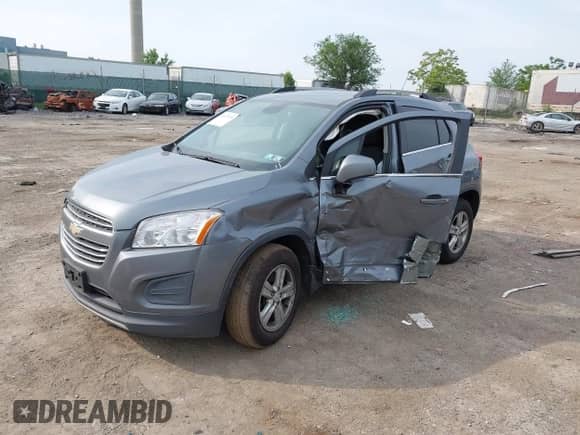 2015 Chevrolet Trax LT with VIN KL7CJRSB3FB118258, listed as a IAAI auction lot 42437439 with 138,557 mi miles and . Bid and sale history available at DreamBid. Image 2.