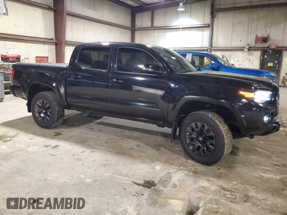 2021 Toyota Tacoma Limited with VIN 3TMGZ5ANXMM430133, listed as a Copart auction lot 57884415 with 36,650 mi miles and Salvage title. Bid and sale history available at DreamBid. Image 4.