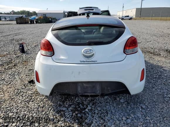 2012 Hyundai Veloster w/Gray Int z VIN KMHTC6AD0CU056764, wystawiony jako Copart lot #84646725 z przebiegiem 157 456 mil mil oraz Czysty tytuł • Clean title. Historia ofert i sprzedaży dostępna na DreamBid. Obrazek 6.