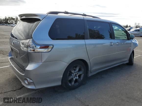 2014 Toyota Sienna SE with VIN 5TDXK3DC2ES465091, listed as a Copart auction lot 80740415 with 122,588 mi miles and Salvage title. Bid and sale history available at DreamBid. Image 3.