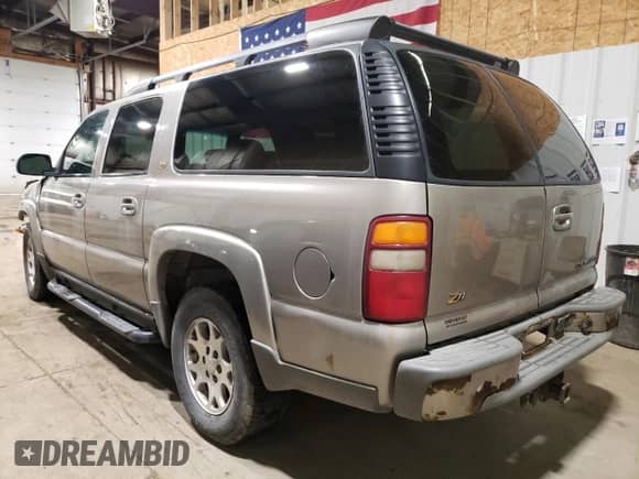 2002 Chevrolet Suburban Z71 z VIN 3GNFK16ZX2G272867, wystawiony jako Copart lot #55130875 z przebiegiem 199 084 mil mil oraz Szkoda całkowita • Salvage title. Historia ofert i sprzedaży dostępna na DreamBid. Obrazek 2.