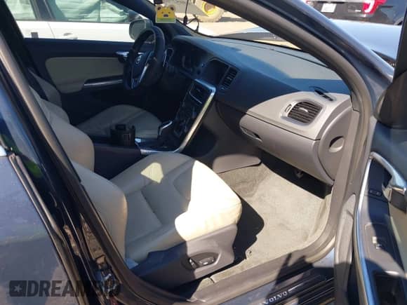 2015 Volvo S60 T5 Drive-E Premier with VIN YV126MFB5F1299795, listed as a IAAI auction lot 43052703 with 100,066 mi miles and . Bid and sale history available at DreamBid. Image 5.