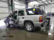 2003 Chevrolet Tahoe LS with VIN 1GNEK13V03J300463, listed as a Copart auction lot 65970125 with 74,950 mi miles and Salvage title. Bid and sale history available at DreamBid. Image 2.