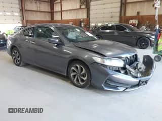 2017 Honda Accord LX-S with VIN 1HGCT1B34HA005209, listed as a IAAI auction lot 43028336 with 73,770 mi miles and . Bid and sale history available at DreamBid. Image 1.